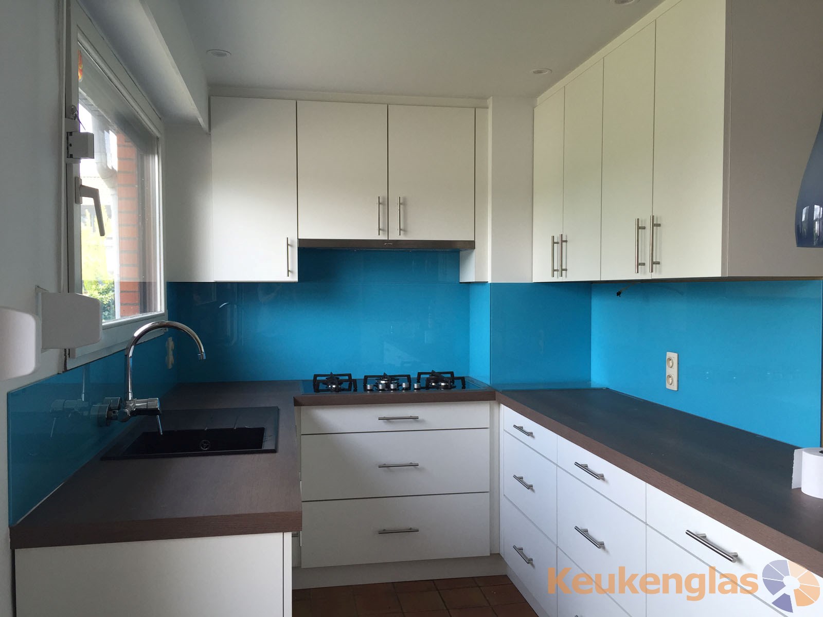 Aqua blauwe keuken achterwand Schoten Belgie